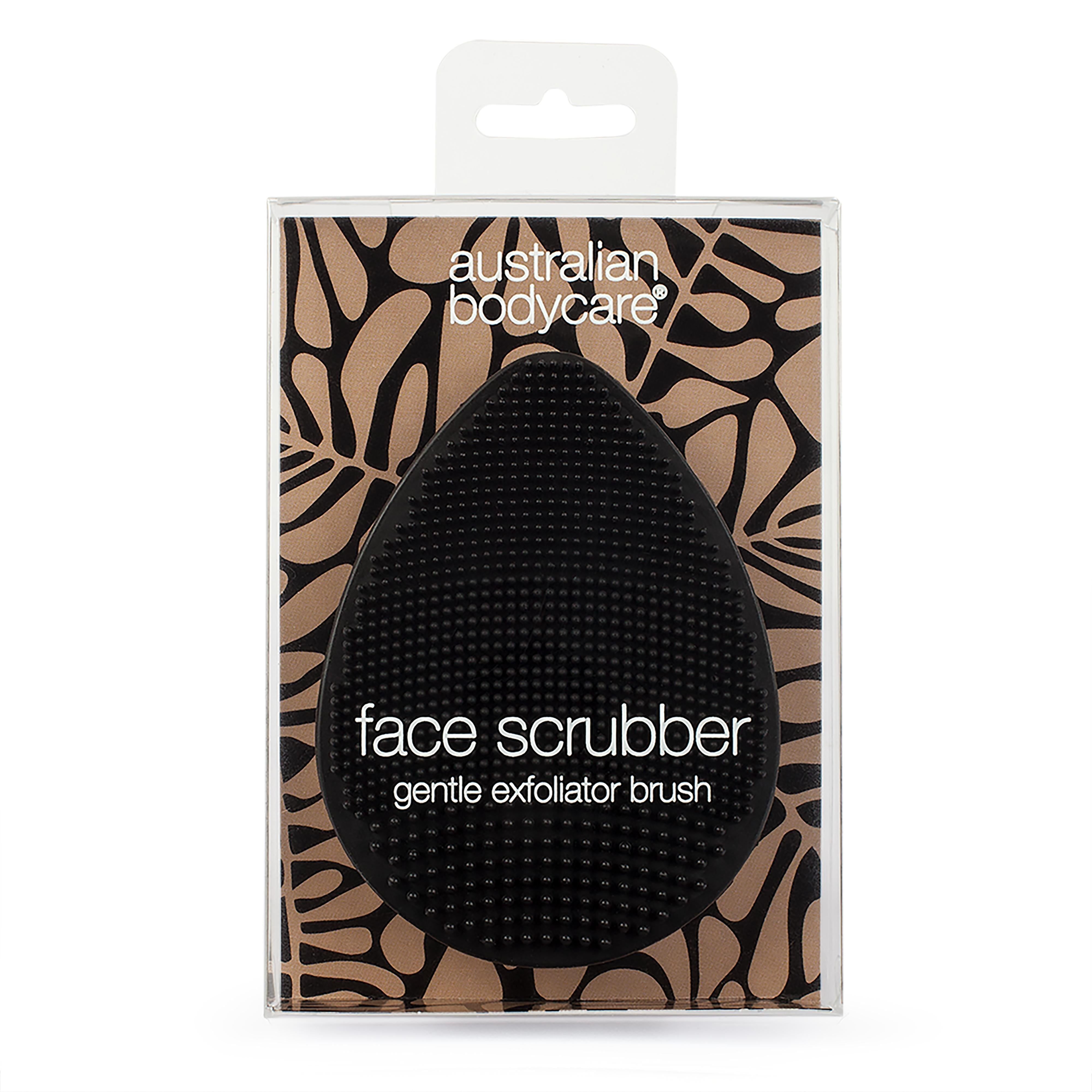 Brosse visage noire en forme de goutte dans un emballage. Marque : Australian Bodycare. Texte : Face Scrubber, gentle exfoliator brush.