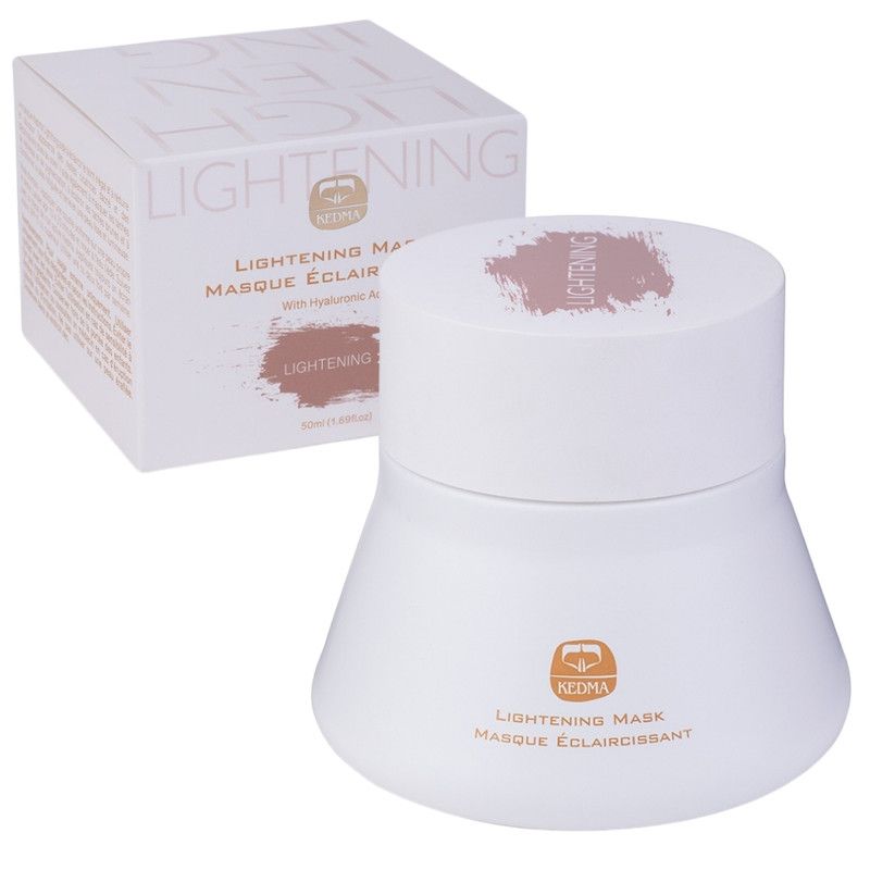 Witte cosmetische pot en doos. Opschrift: LIGHTENING, Kedma, Lightening Mask, Masque Éclaircissant.