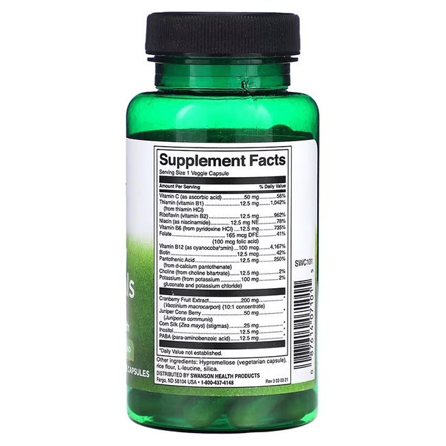 Achterkant van een groene fles. Label met voedingsfeiten en ingrediënten. Bevat cranberry-extract en jeneverbes.