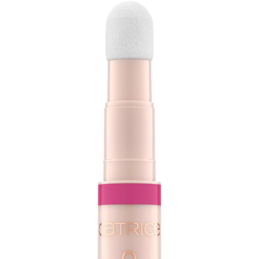 Lipolie-applicator met sponsuiteinde. Roze behuizing, roze ring. Opschrift: CATRICE COLOUR CUSHION JUICY LIP OIL.