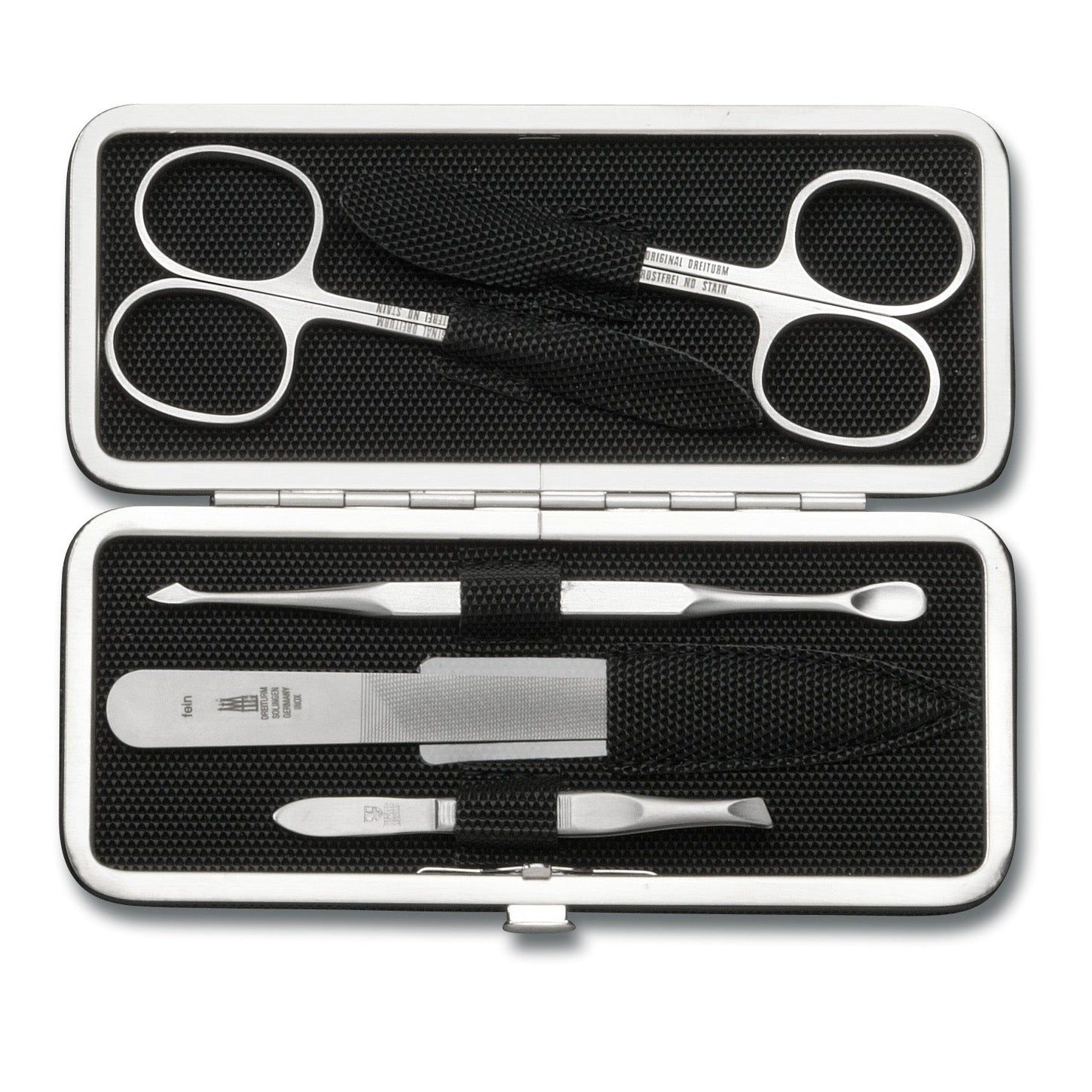 Manicure etui, zilverkleurige metalen behuizing, zwarte binnenvoering. Bevat nagelschaar, pincet, nagelvijl en andere tools.