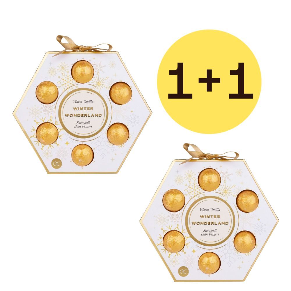 Deux coffrets cadeaux hexagonaux avec bombes de bain dorées. Inscription : Winter Wonderland. Cercle jaune avec "1+1".