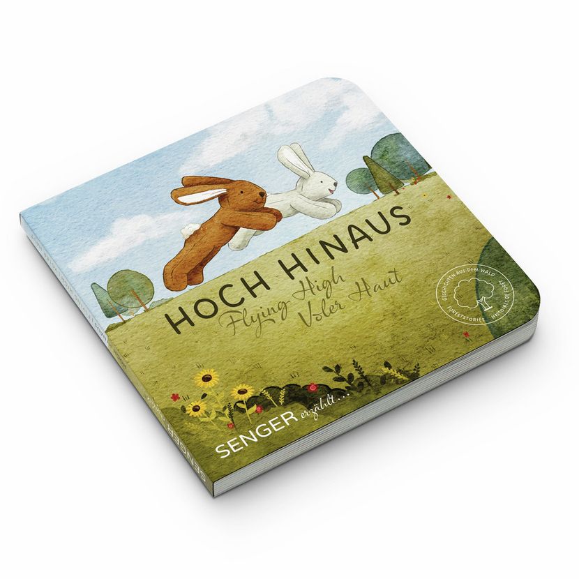 Livre carré avec illustrations de lapins. Titre : Hoch Hinaus. Marque : Senger. Sur fond blanc.