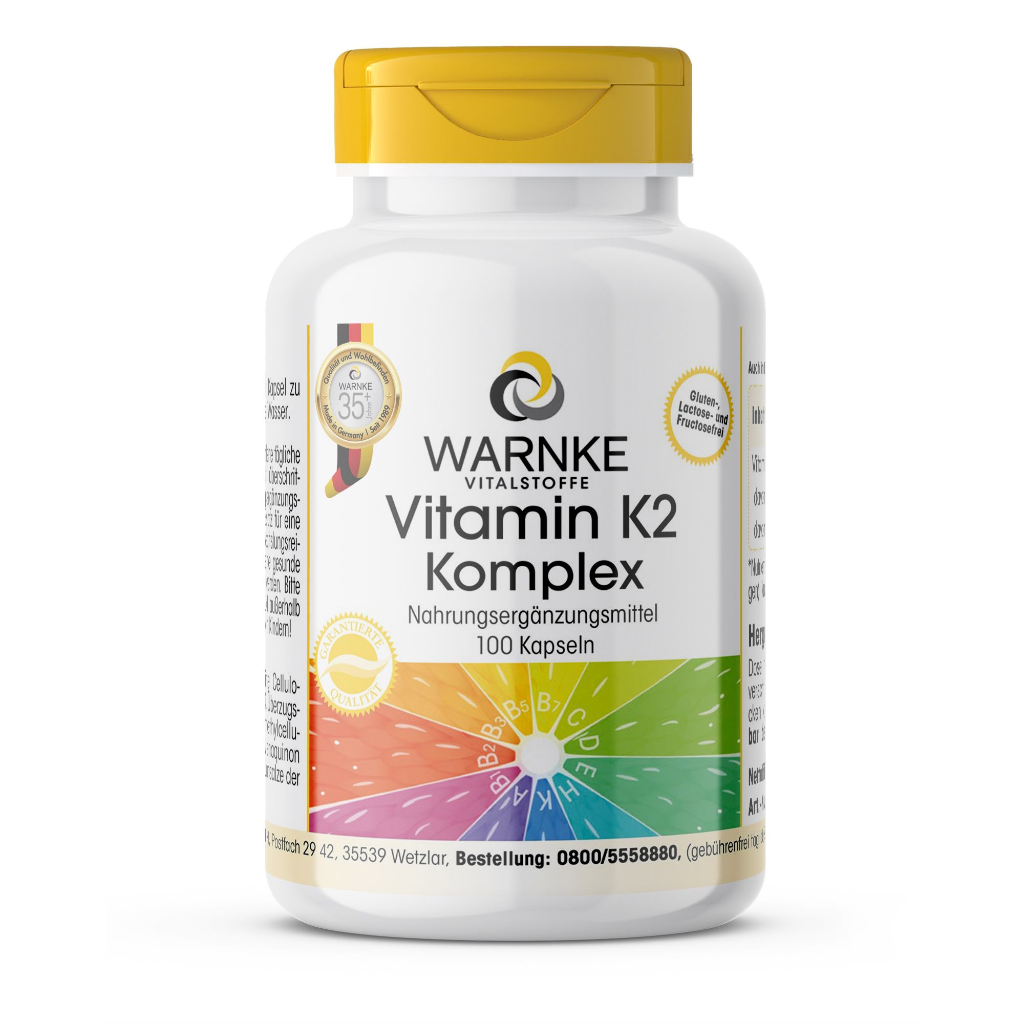 Witte fles met gele dop. Opschrift: Warnke Vitamin K2 Komplex, voedingssupplement, 100 capsules. Met certificeringen.