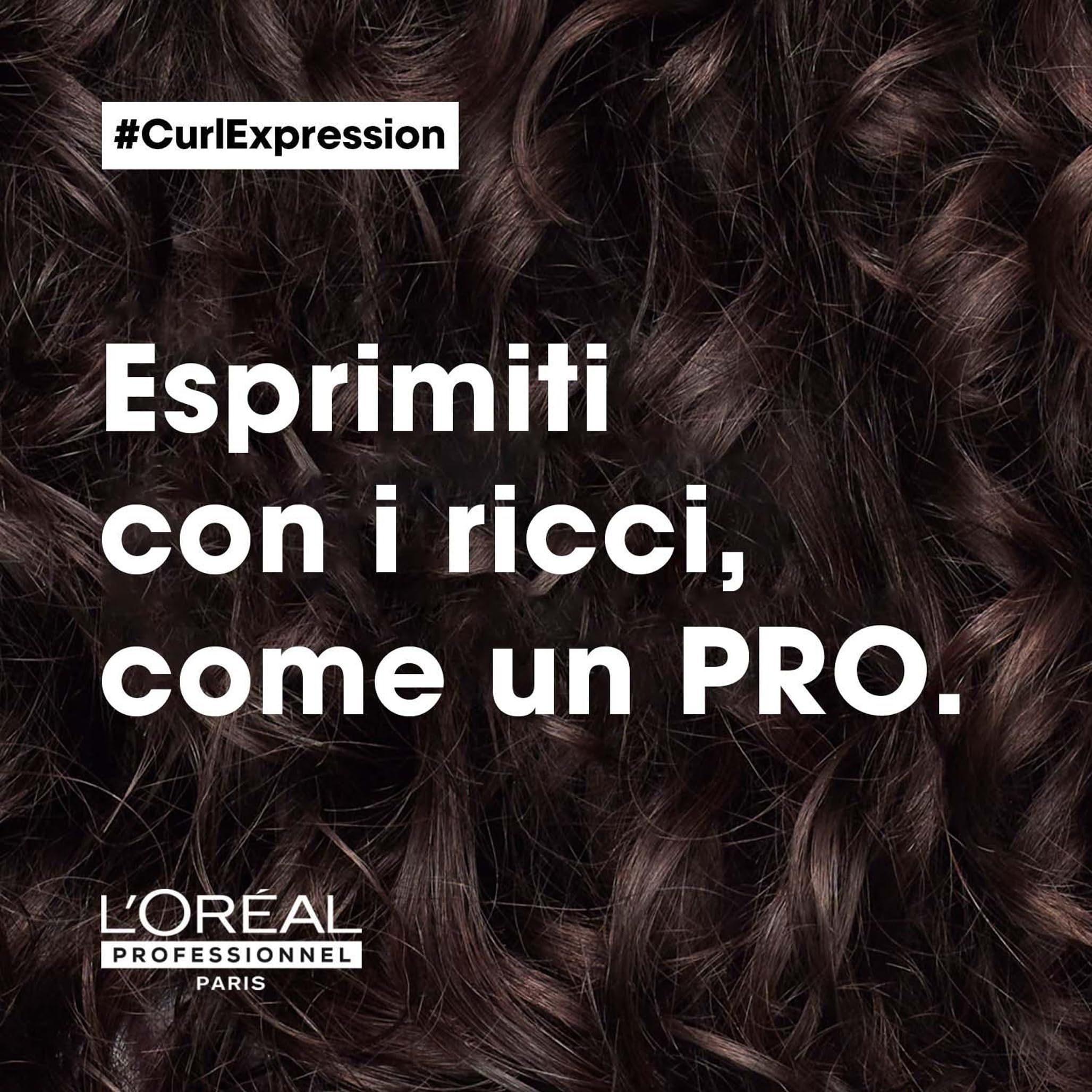 Close-up van volle, gedefinieerde krullen met het L'Oréal Professionnel Paris logo.