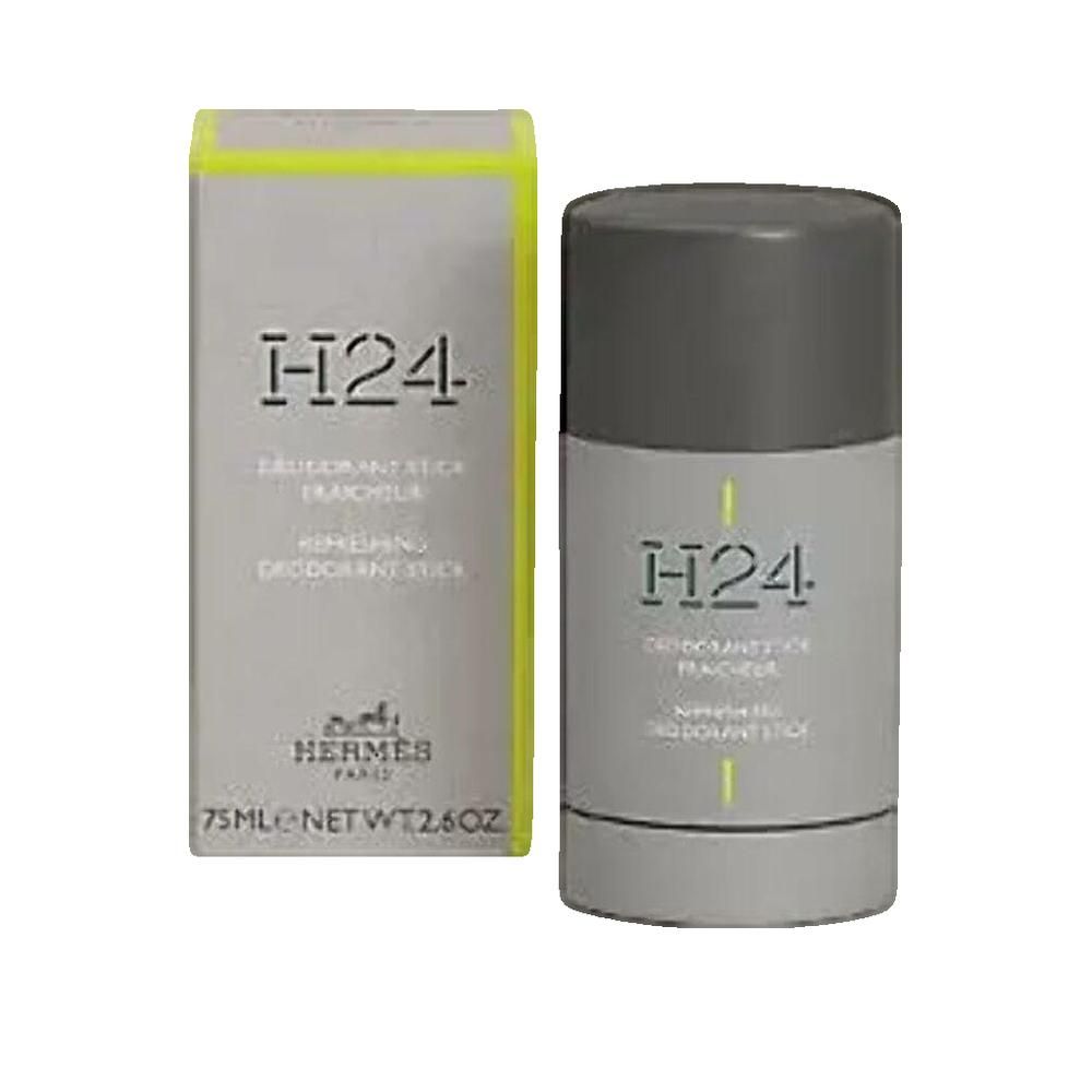 Deodorantstick en verpakking. Grijze stick met dop, grijze verpakking met gele accenten. Opschrift: H24, Hermes Paris.
