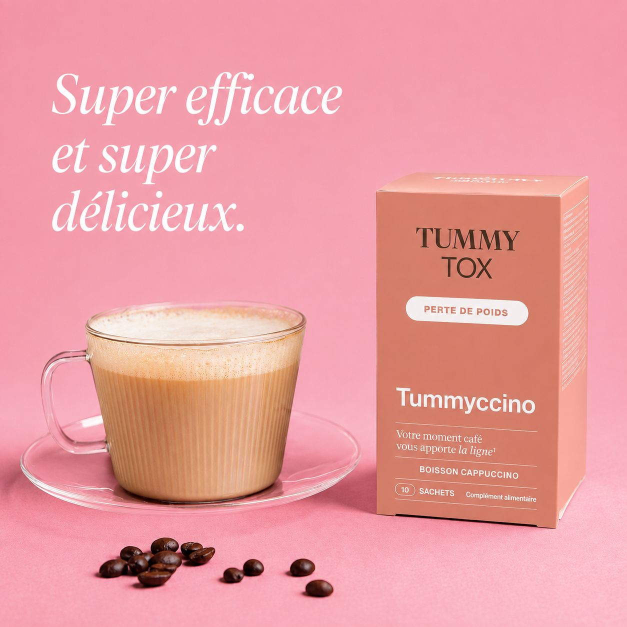 Boîte Tummy Tox et une tasse de cappuccino avec des grains de café.