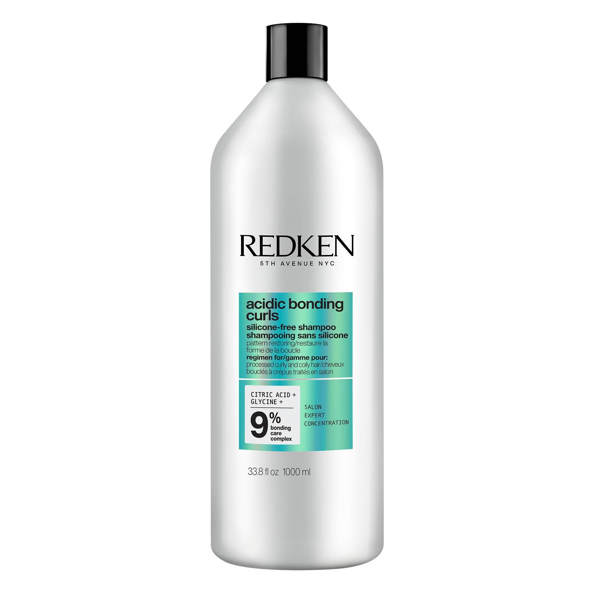 Siliconenvrije shampoo in witte fles met zwarte dop. Opschrift: REDKEN, acidic bonding curls.