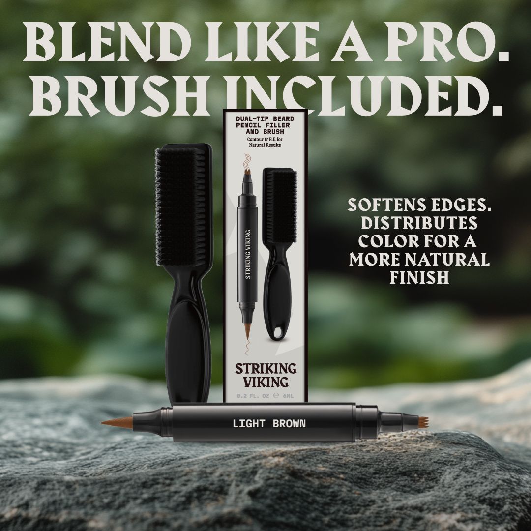 Stylo pour barbe brun clair, avec brosse, posé sur des pierres.