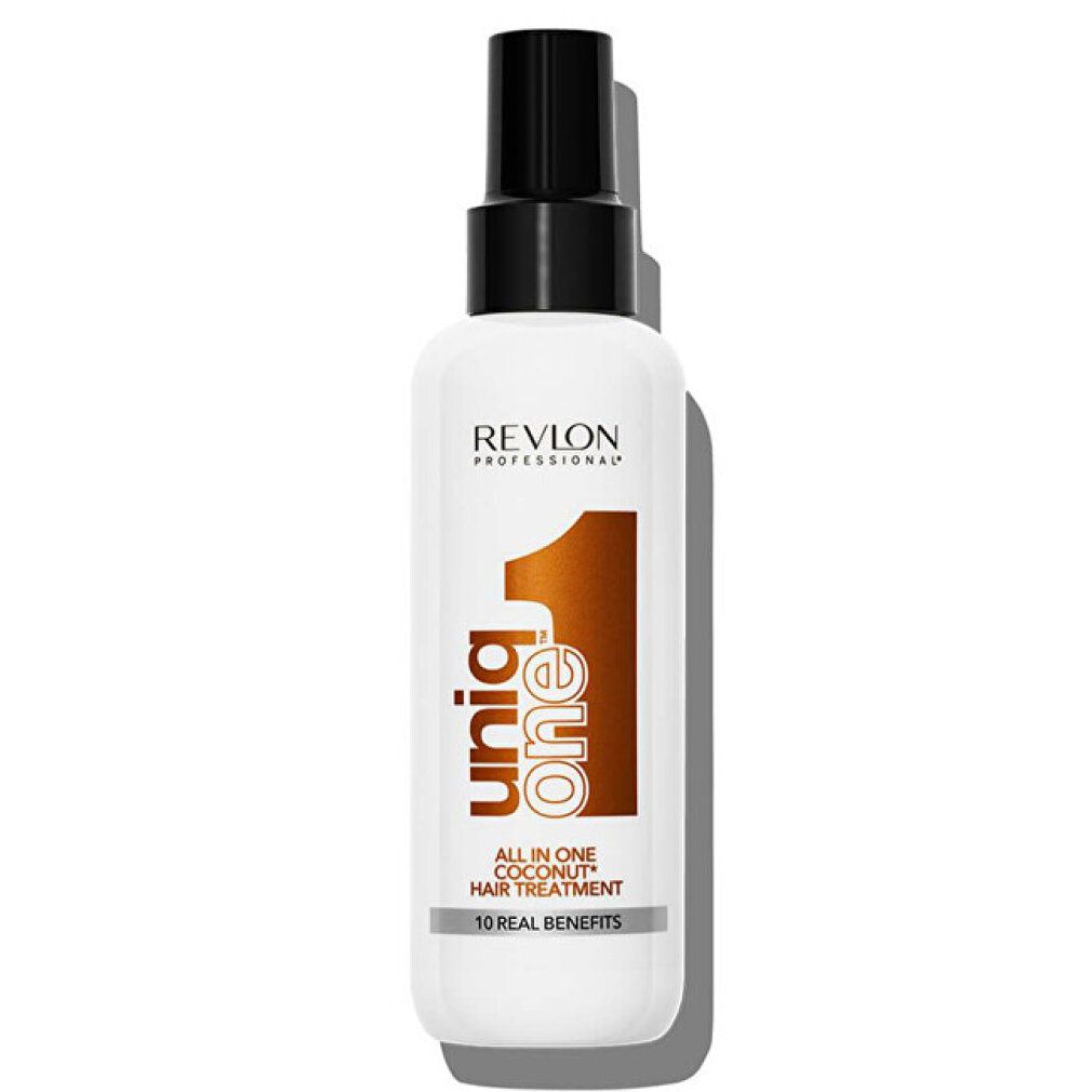 Revlon Uniq One Coconut Hair Treatment. Flacon blanc avec vaporisateur noir. Inscription: All in One Coconut Hair Treatment, 10 Real Benefits.