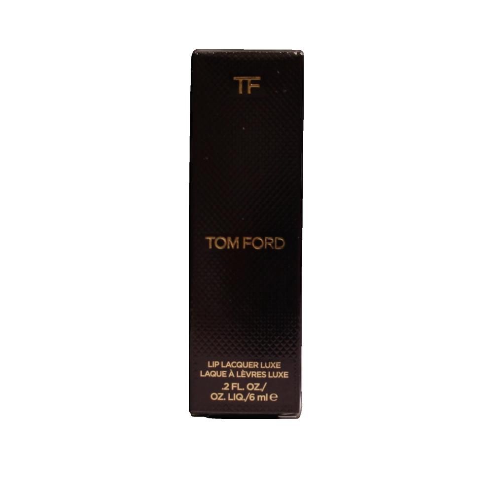 Emballage noir avec logo "TF" doré et texte "TOM FORD". Texte: "LIP LACQUER LUXE". 2 FL. OZ./6 ml.