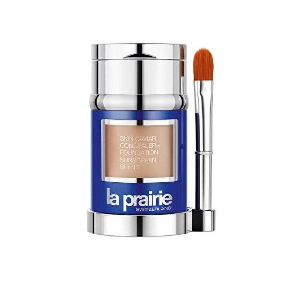 La Prairie Skin Caviar Foundation, Sunset Beige. Récipient bleu, capuchon argenté, pinceau. Informations produit sur le récipient.