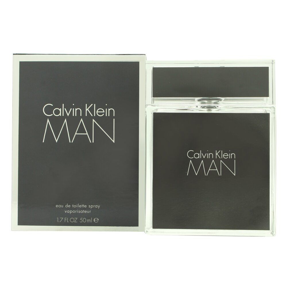 Boîte et flacon gris foncé. Inscription "Calvin Klein MAN". Flacon avec bouchon argenté. Texte : "Eau de Toilette Spray".