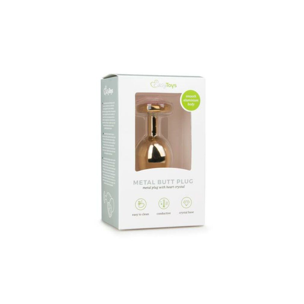 Verpakking van een gouden anale plug met hartvormige siersteen.