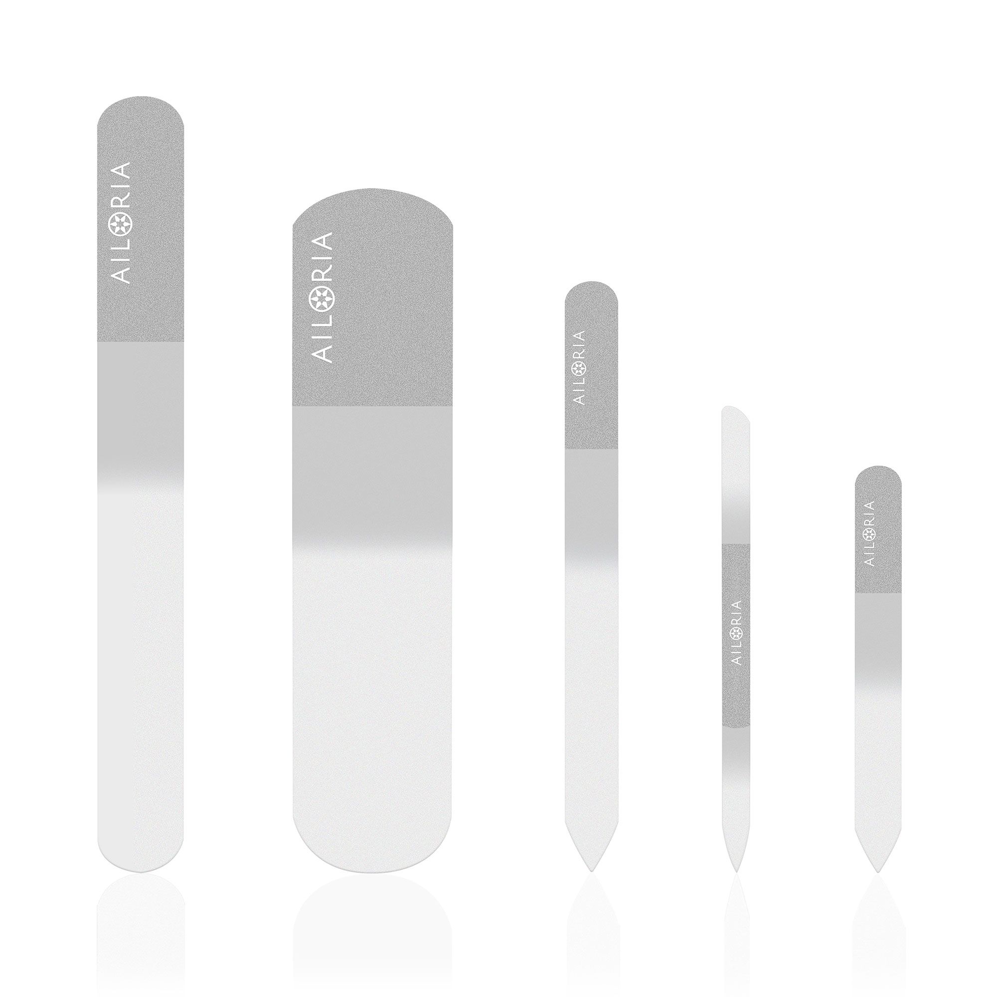Cinq limes à ongles en verre de différentes tailles. Marque AILORIA sur chaque lime. Différentes formes et tailles.