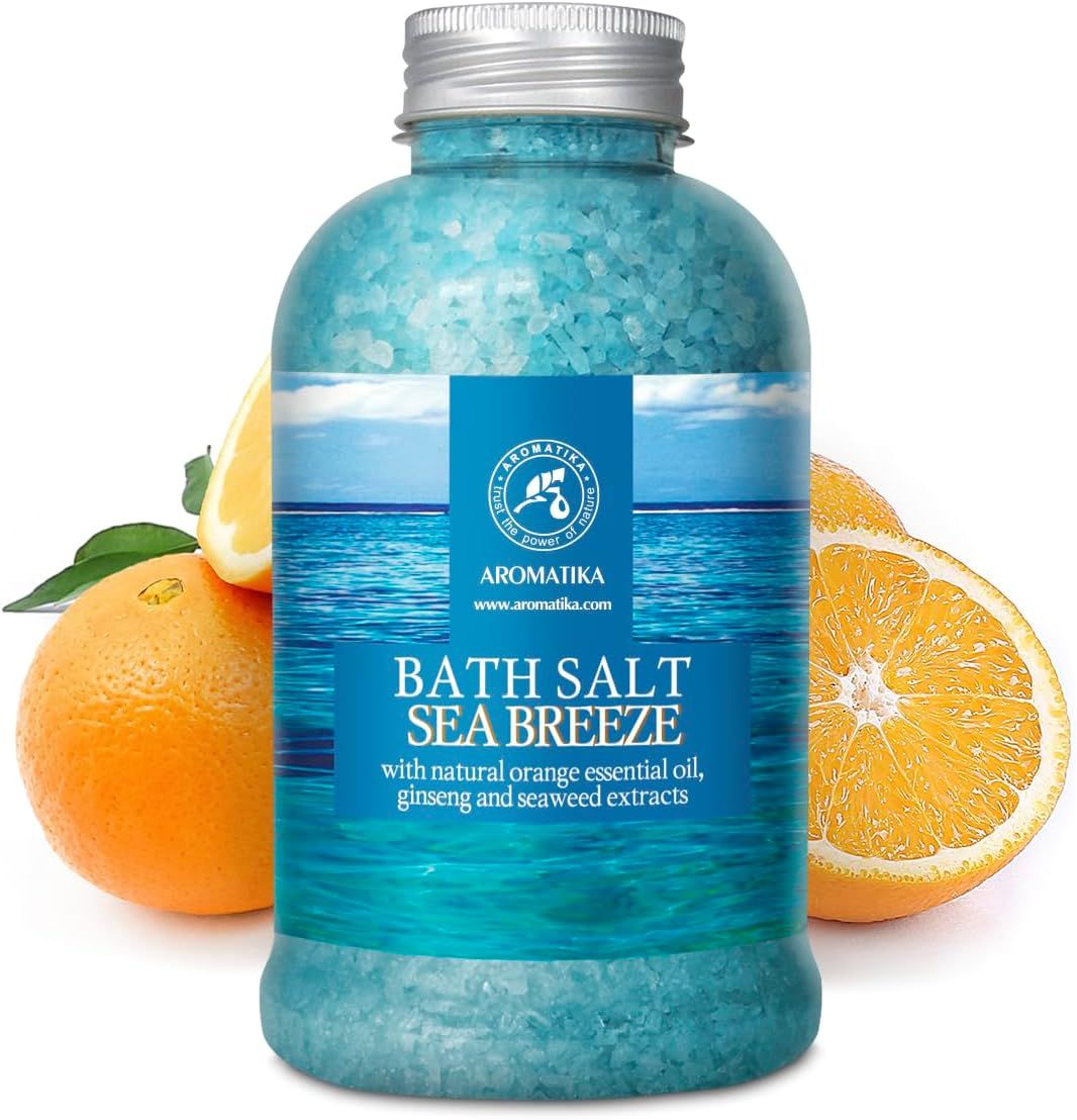 Fles badzout "Sea Breeze" met sinaasappels en sinaasappelschijfjes.