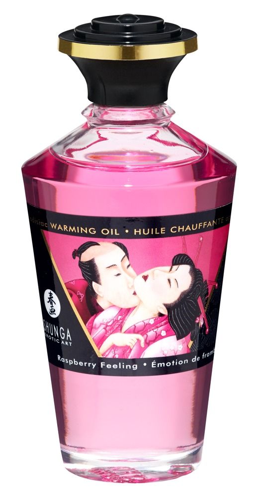 Roze massageolie fles. Opschrift: Shunga, frambozensmaak. Illustratie: kussend paar. Fles: glas, zwarte dop.