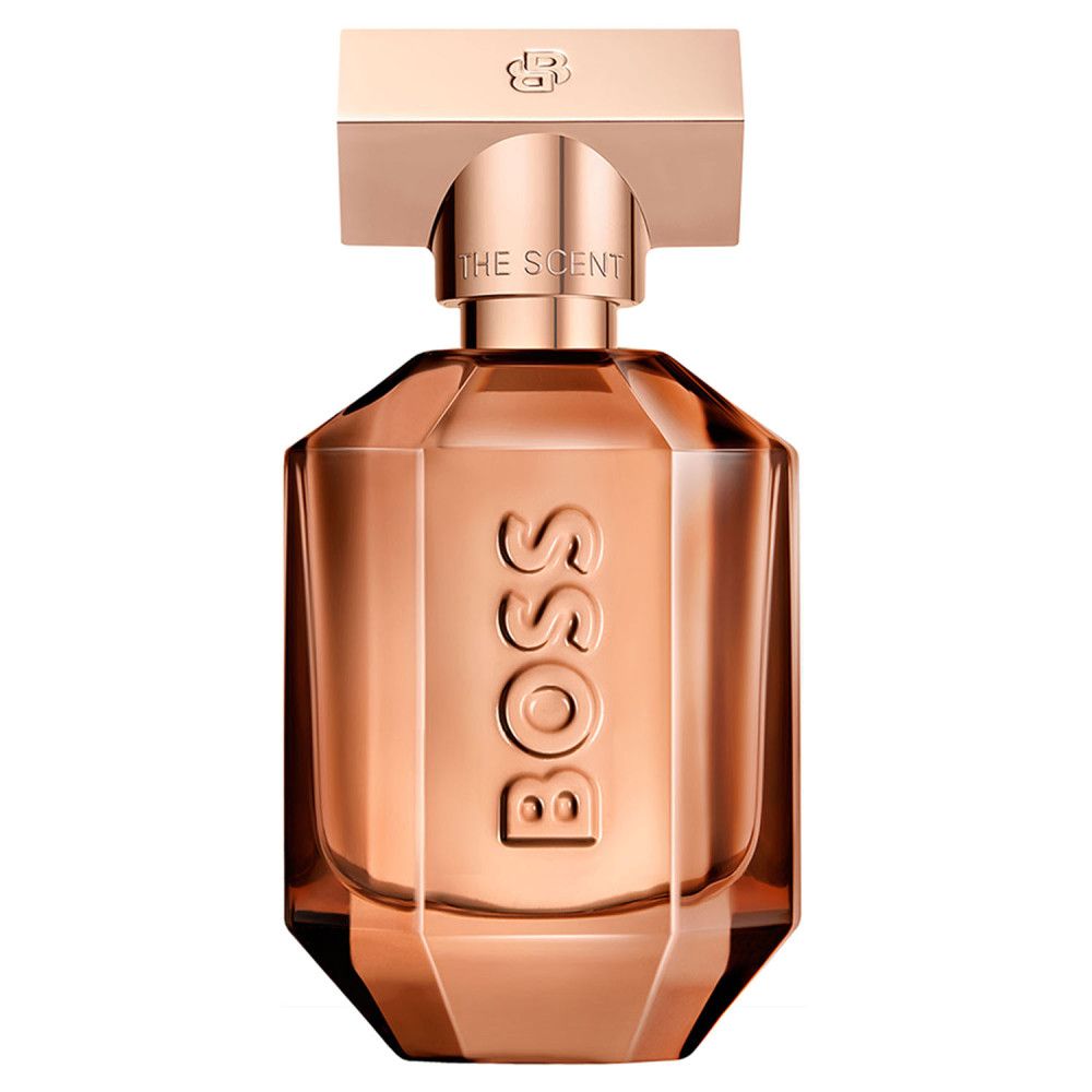 Koperkleurige parfumfles. Achthoekige vorm, goudkleurige dop. Opschrift BOSS. Productnaam: The Scent.
