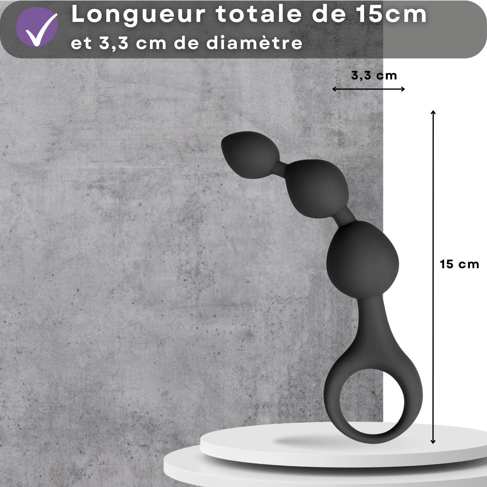 Perles anales en silicone, 3 boules. Dimensions: 15 cm x 3,3 cm. Sur socle.