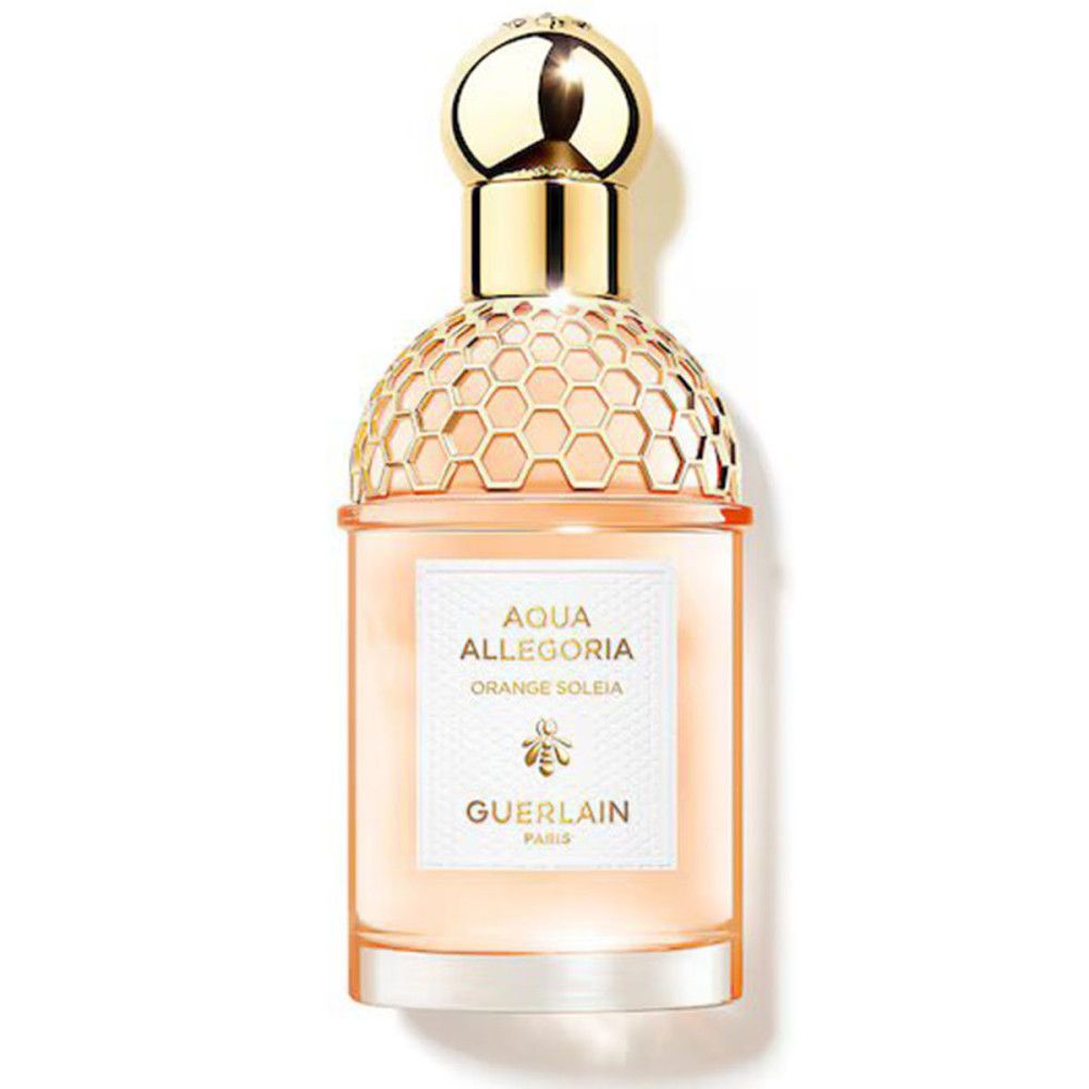 Flacon de parfum avec bouchon doré et motif en nid d'abeille. Étiquette avec Aqua Allegoria, Orange Soleia et Guerlain.