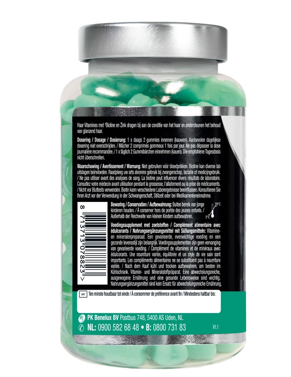 Dos du flacon de vitamines. Texte multilingue. Contient des informations sur les ingrédients et le dosage.