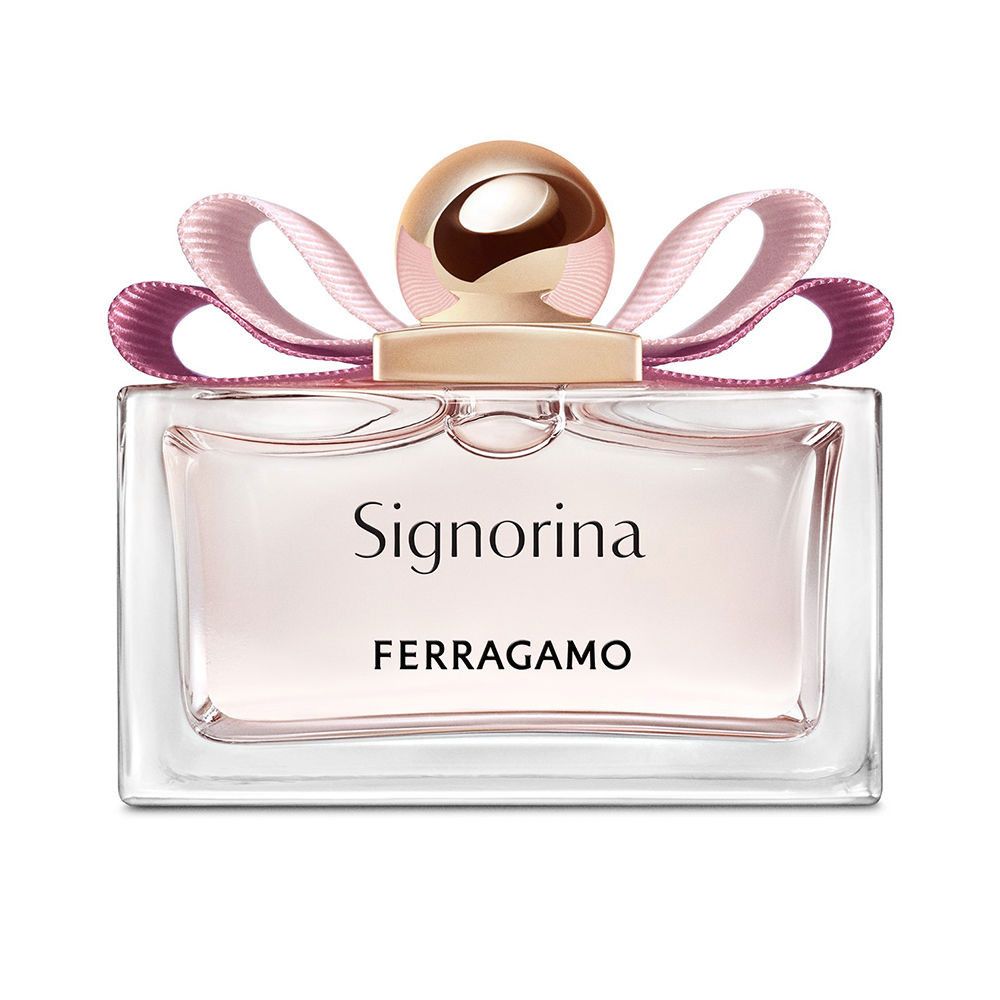 Signorina Eau de Parfum de Ferragamo. Flacon rectangulaire avec liquide rose, nœud rose et bouchon doré.