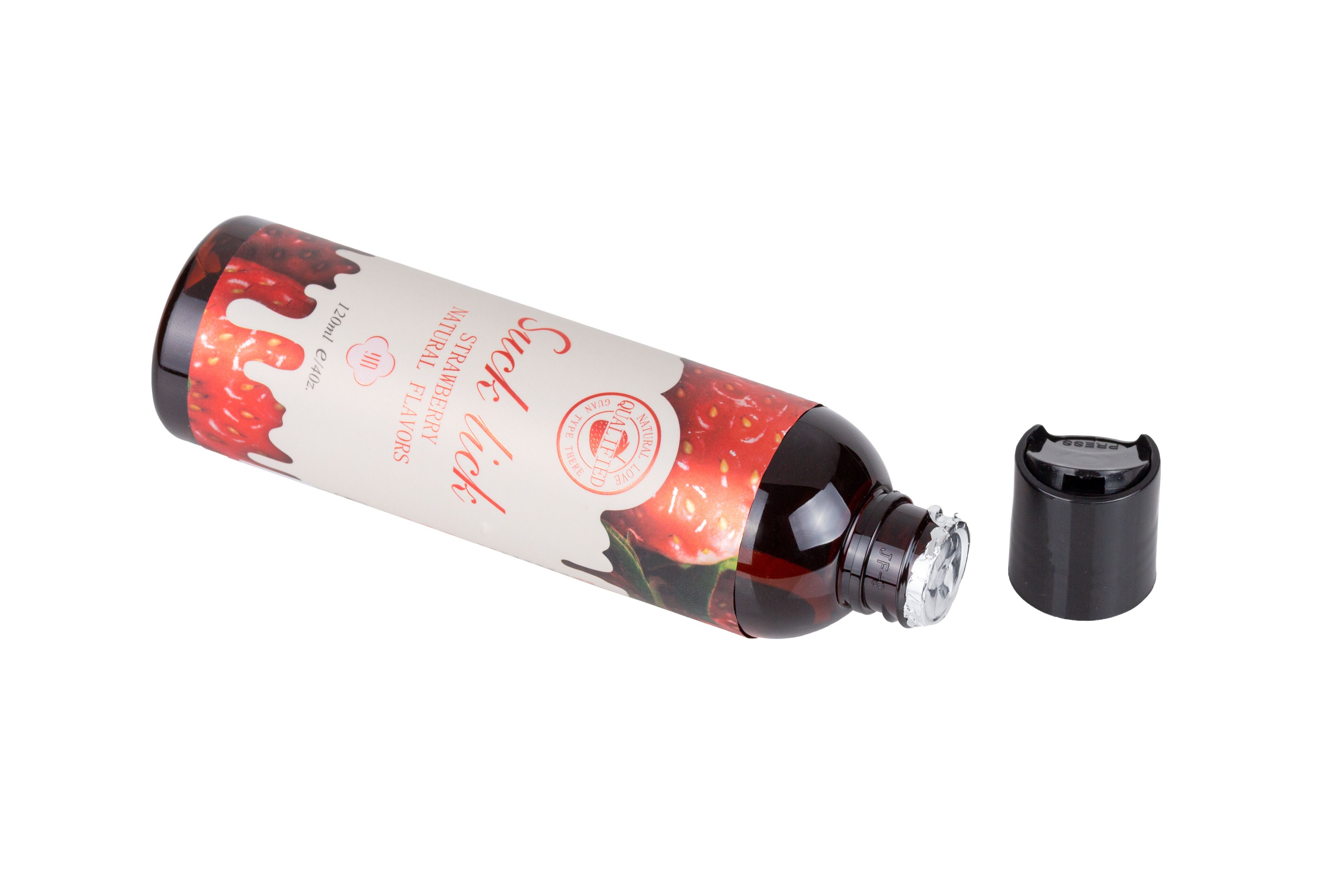 Flacon de liquide rouge, bouchon noir et feuille ouverte. Inscription: Suck lick, saveur fraise.