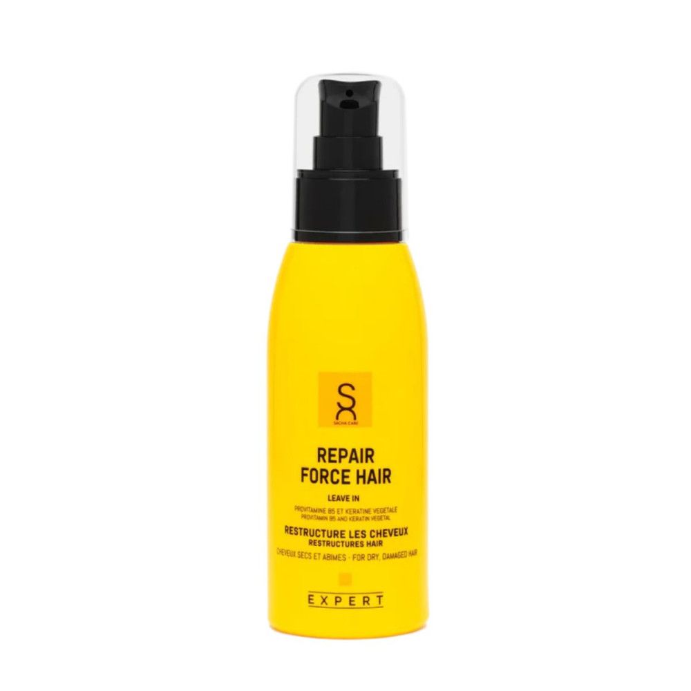 Flacon jaune avec pompe noire. Inscription: Repair Force Hair, Leave In. Pour cheveux secs et abîmés. Expert.