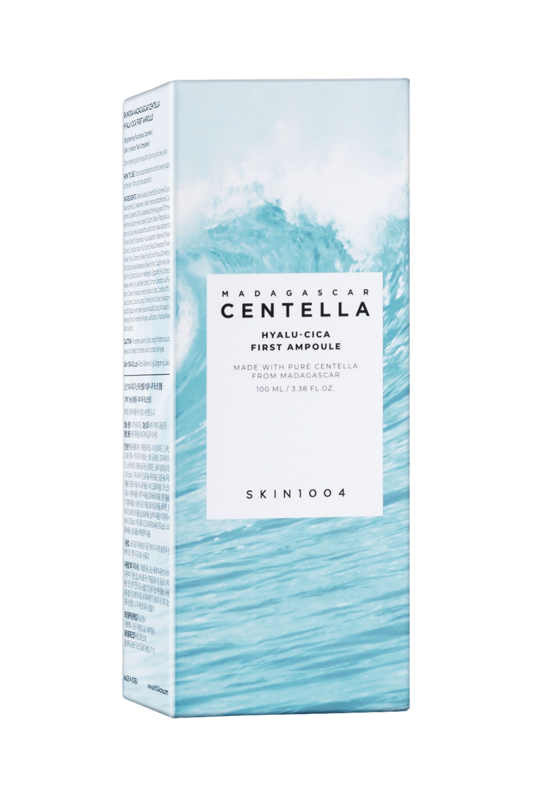 Kartonnen verpakking met productnaam en merk SKIN1004. Golfpatroon op blauwe achtergrond.