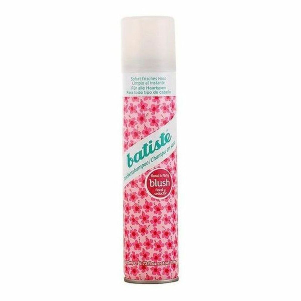 Bombe aérosol rose et blanche. Inscription: Batiste, shampooing sec, Blush. Motif floral.