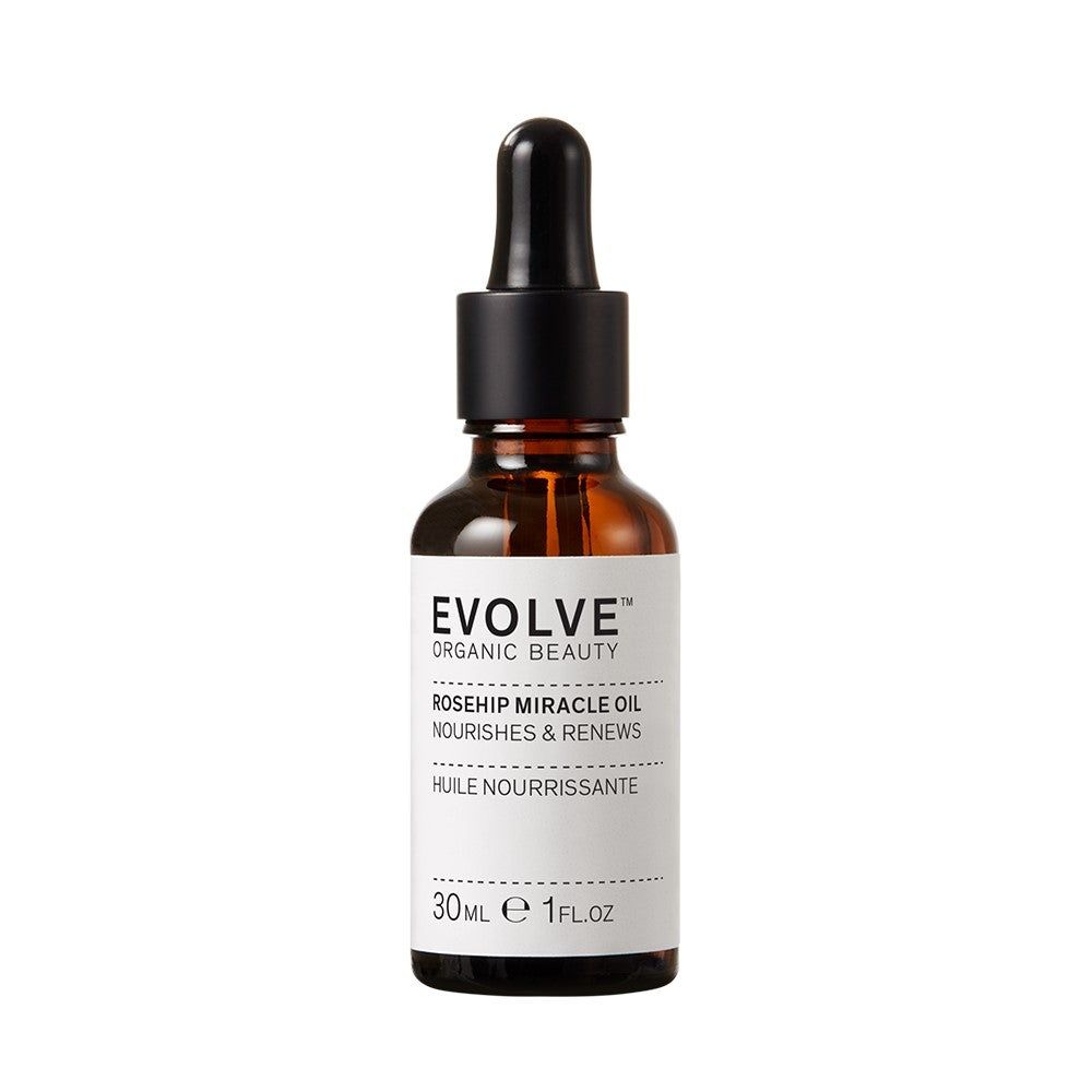 Flacon en verre brun avec bouchon noir et pipette. Étiquette avec nom du produit et marque. 30ml.