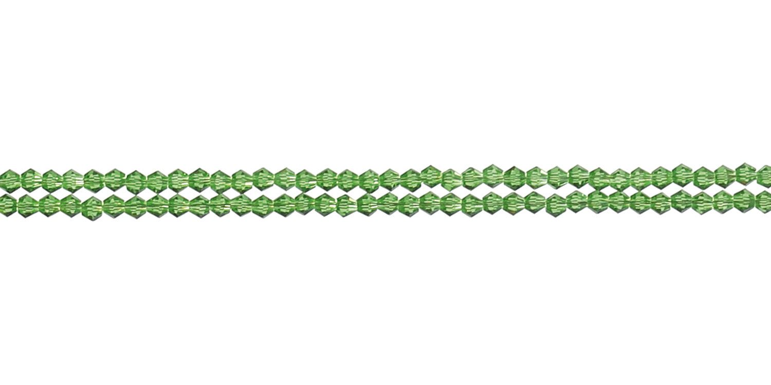 Cordon à lunettes vert à perles. Trois brins de petites perles à facettes.