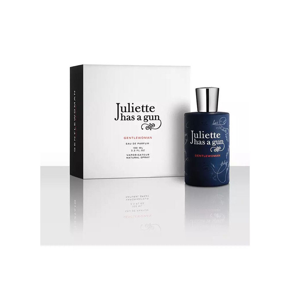 Donkerblauwe fles en witte doos. Opschrift: Juliette has a gun, Gentelwoman. Fles met zilveren dop.