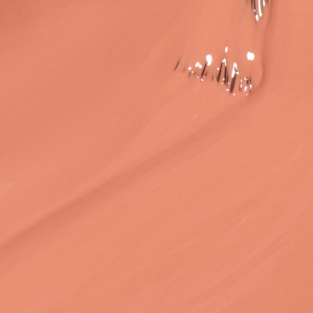 Nagellak applicator in een crèmekleurige lak. De borstel is gedeeltelijk bedekt met lak.