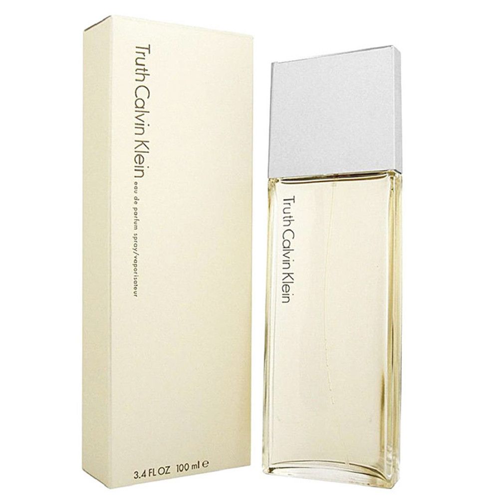 Flacon de parfum et emballage. Flacon rectangulaire transparent avec bouchon argenté. Emballage crème avec texte.