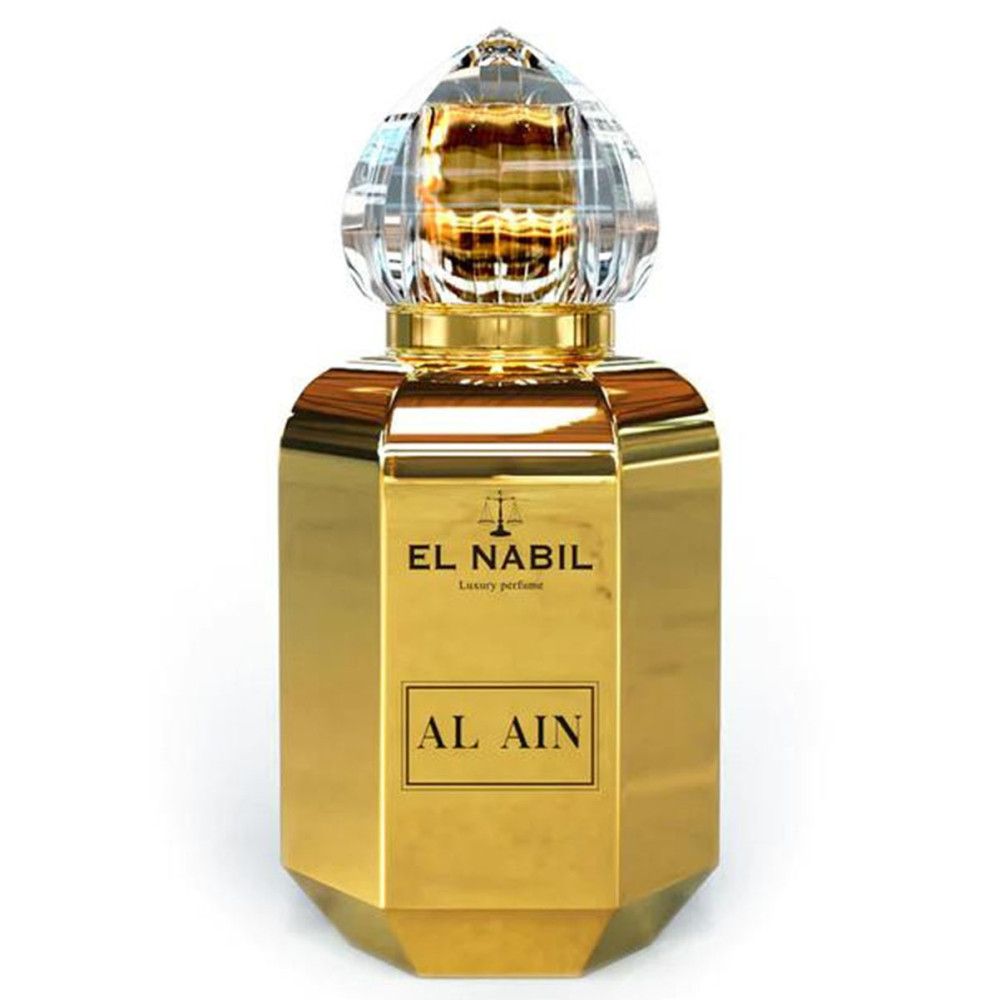 Flacon doré avec bouchon en cristal. Inscription : EL NABIL, AL AIN. Parfum de luxe.