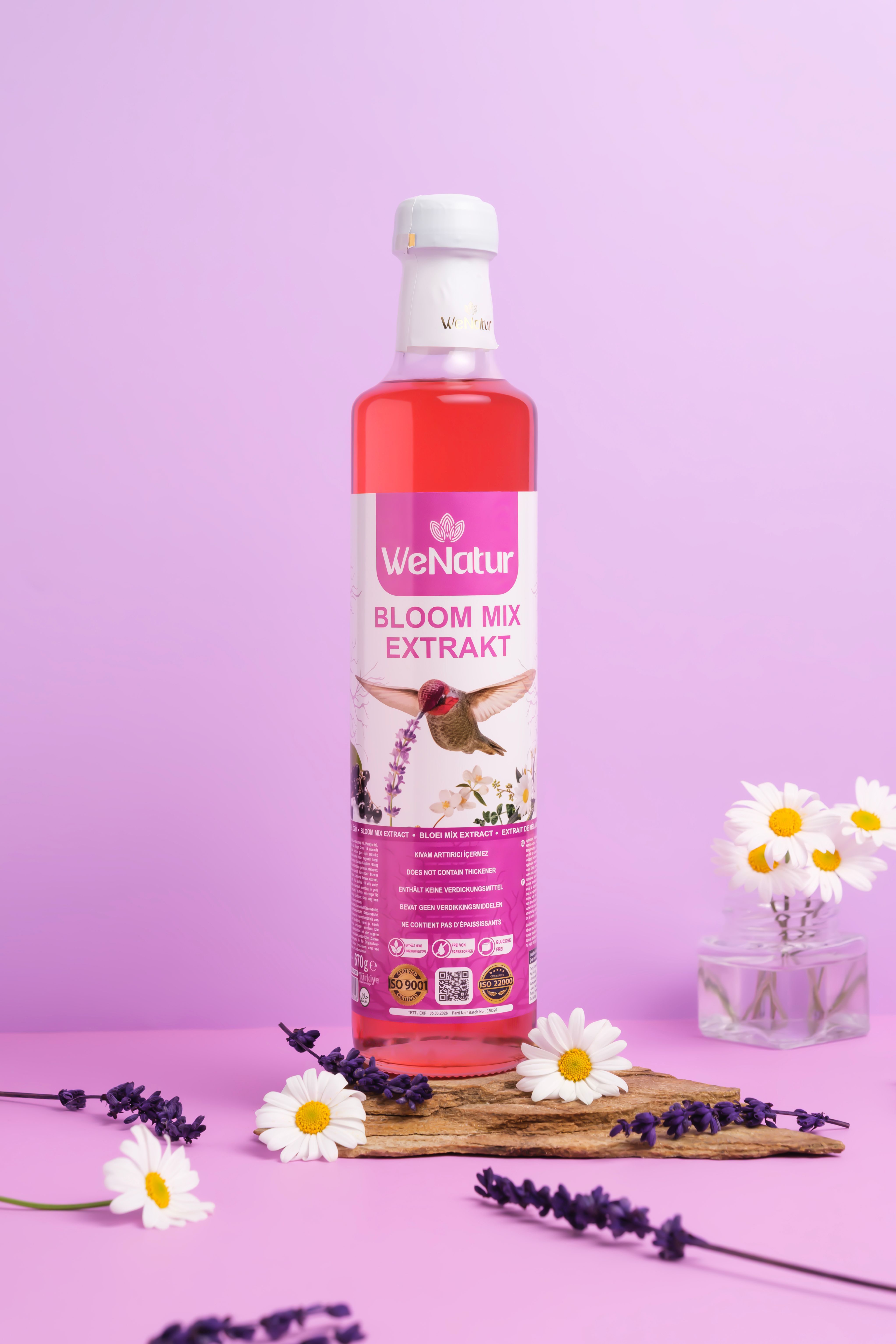 Fles WeNatur Bloom Mix Extract met kolibrie en bloemen.