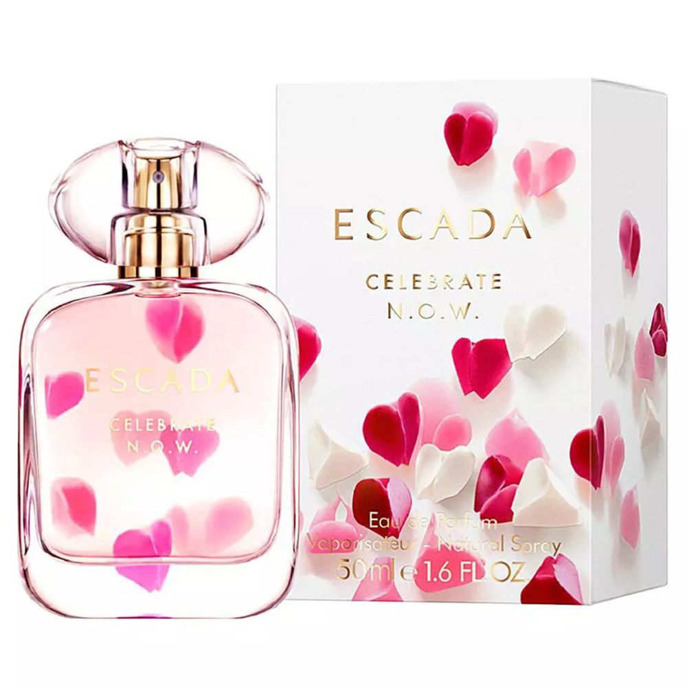 Flacon et emballage d'Escada Celebrate N.O.W. Eau de Parfum avec pétales.