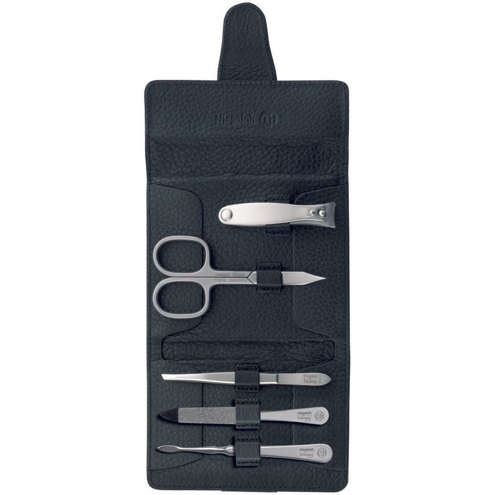 Étui en cuir noir avec set de manucure. Ciseaux à ongles, coupe-ongles, lime, pince à épiler et cure-ongles. Fabriqué à Solingen.