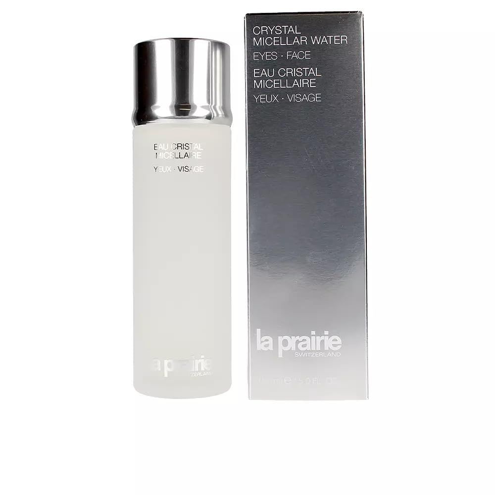 Cilindrische fles en doos. Opschrift: Crystal Micellar Water, Eyes Face. Merk: la prairie.