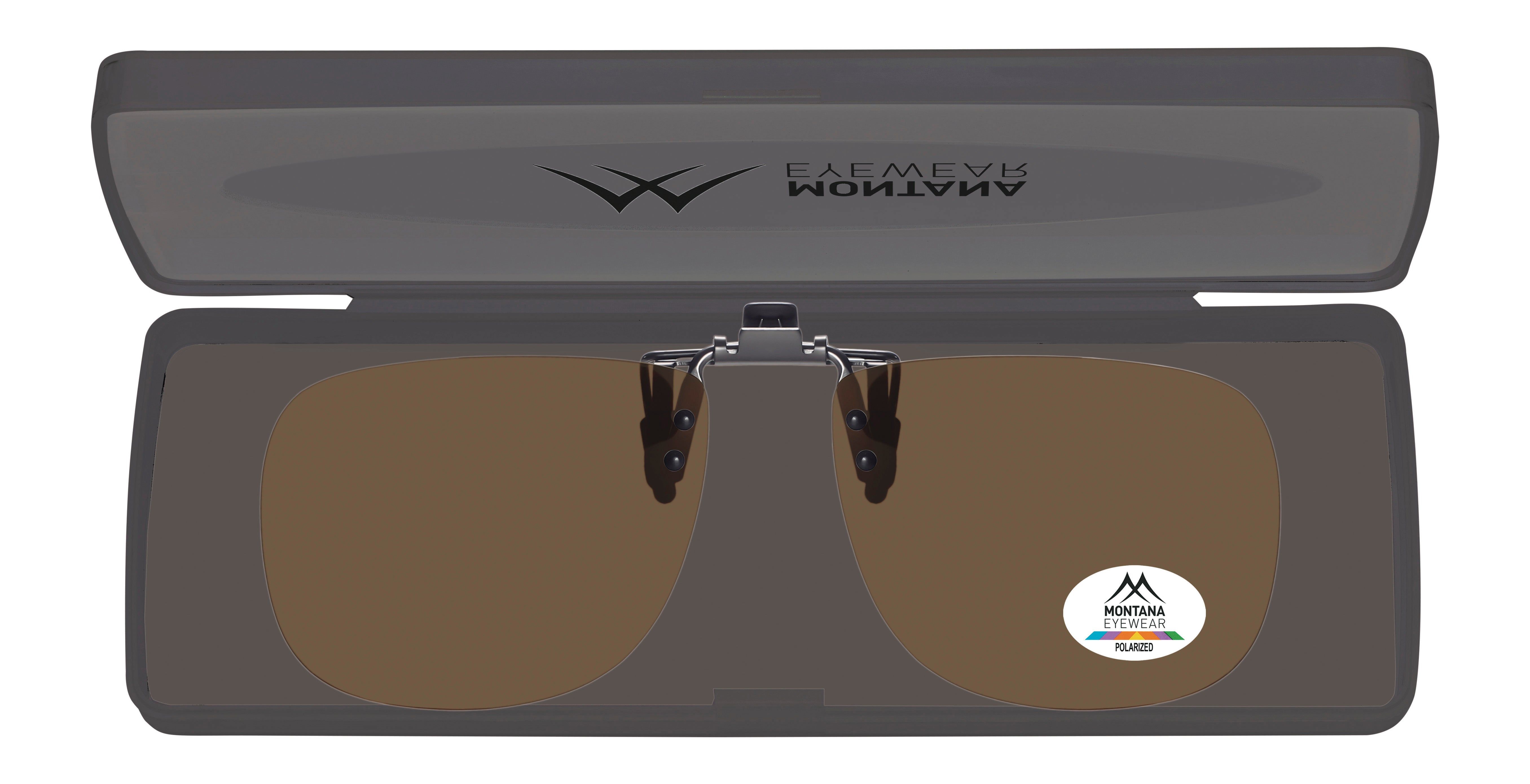 Lunettes de soleil à clipser dans un étui. L'étui est gris et porte l'inscription ANATOMY. Le logo Montana Eyewear est visible sur un verre.