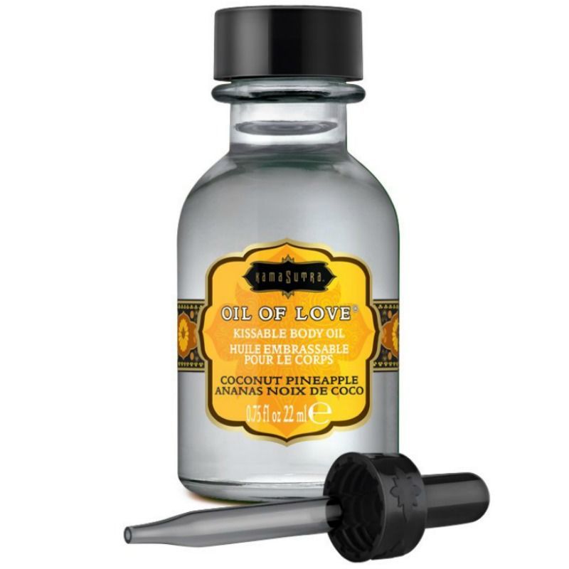 Flacon transparent avec pipette. Inscription: Oil of Love, noix de coco ananas. 0.75 fl oz 22 ml.