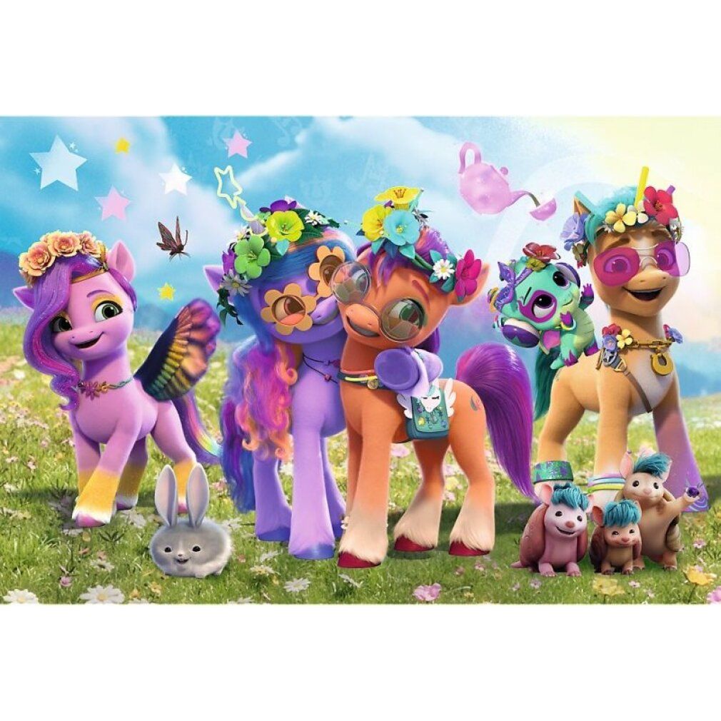 Puzzel met kleurrijke pony's en konijn op een weide. Sterren en bloemen op de achtergrond.