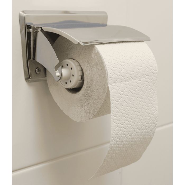 Support de papier toilette en métal sur un mur. Le papier est déroulé. Le support est relié à un support blanc.