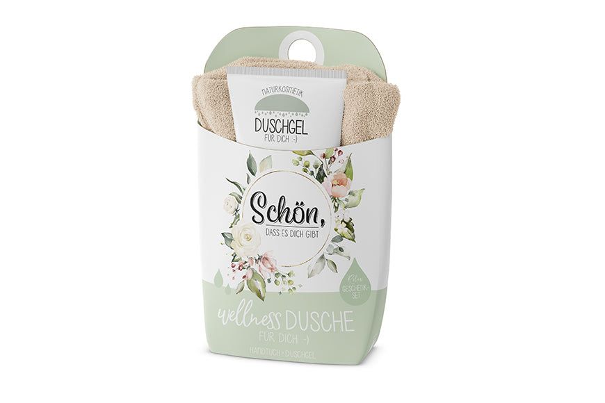 Coffret cadeau douche bien-être avec gel douche et serviette. Emballage avec motif floral et texte : Schön, dass es dich gibt.