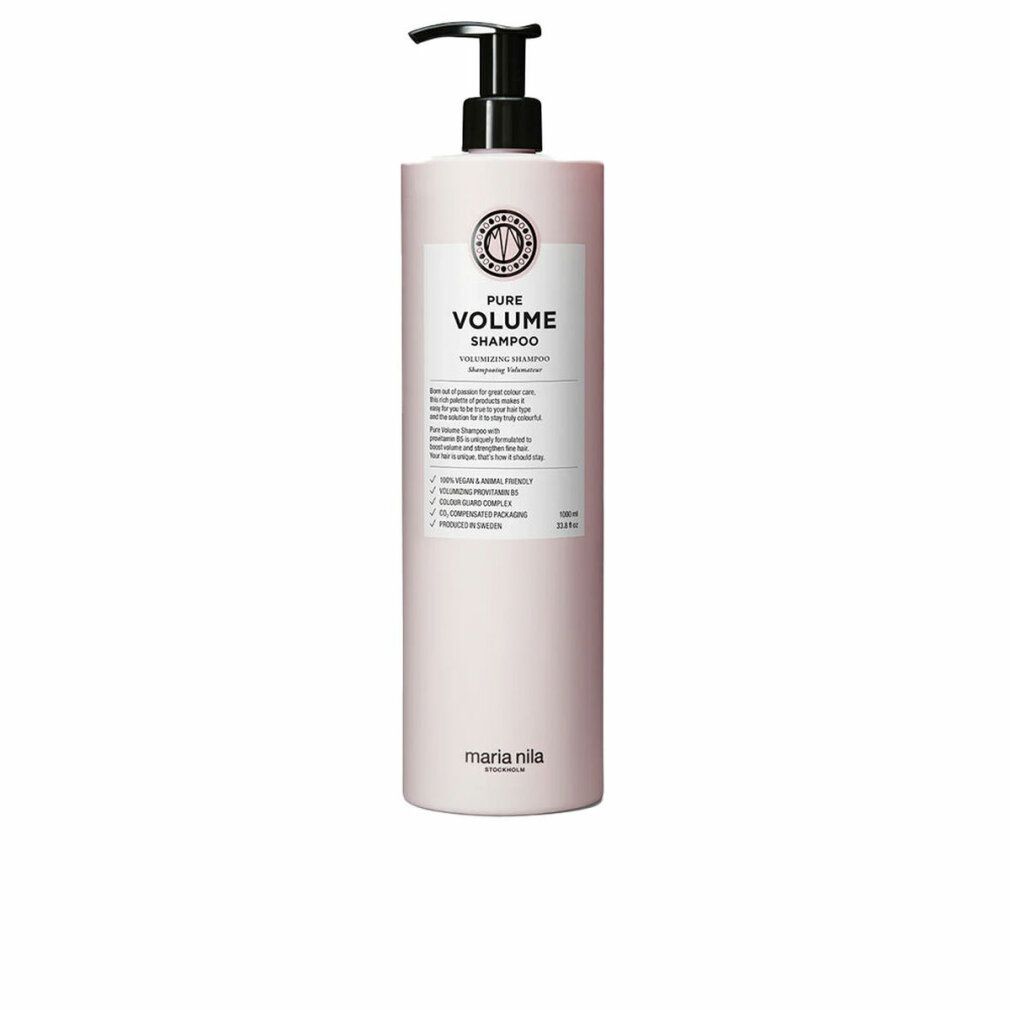 Flacon de shampooing rose avec pompe noire. Étiquette avec texte: PURE VOLUME SHAMPOO. Marque: Maria Nila.