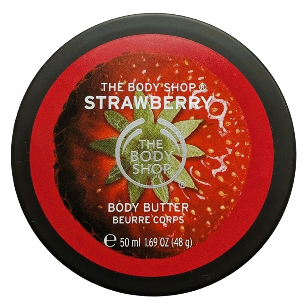 Pot rond avec motif fraise et couvercle rouge. Texte: The Body Shop, Strawberry, Body Butter, Beurre Corps.