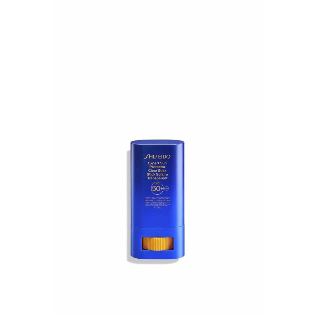Stick bleu avec mécanisme rotatif jaune. Inscription: Shiseido, Expert Sun Protector, Clear Stick, SPF 50+.