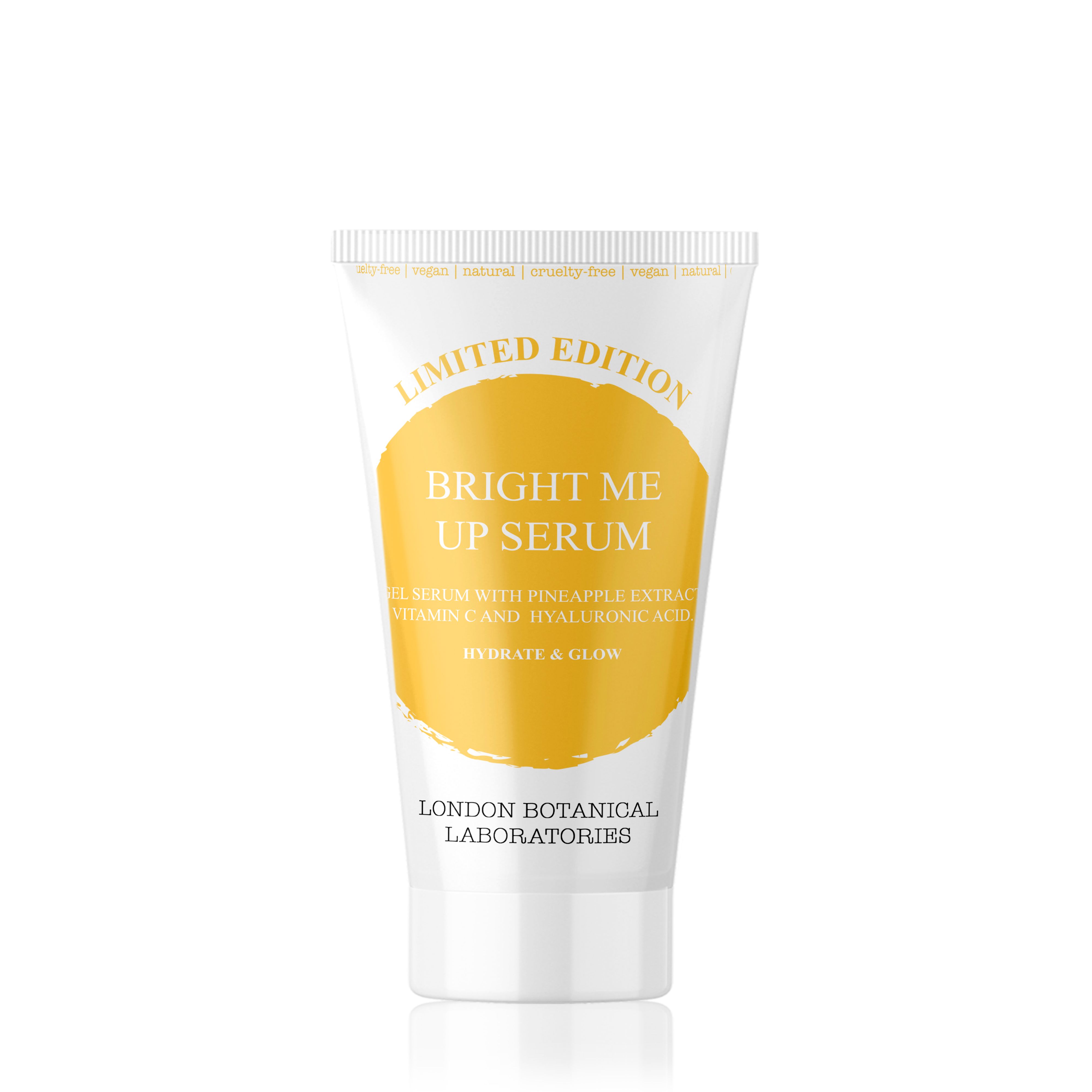 Witte tube met gele cirkel en productnaam. Opschrift: Bright Me Up Serum, London Botanical Laboratories. Met opdrukken.