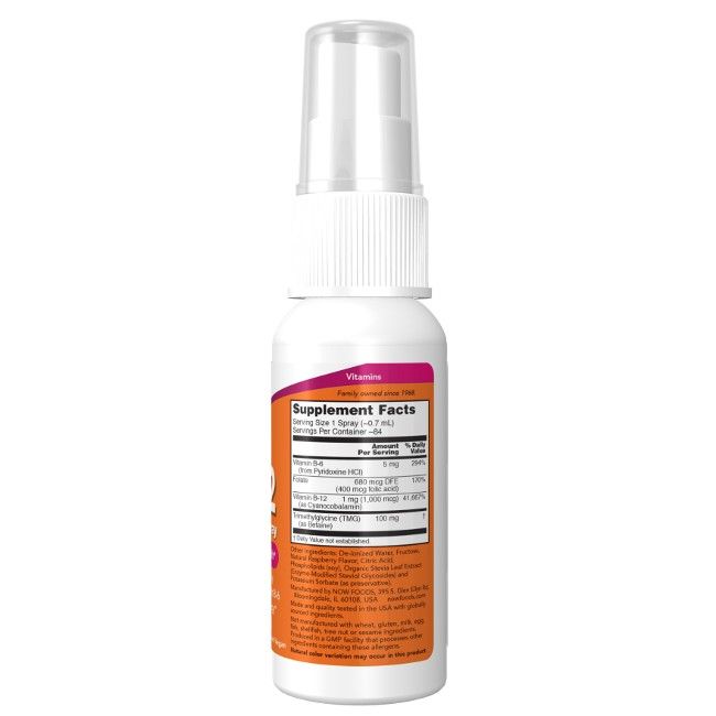 Flacon pulvérisateur blanc avec étiquette orange. Texte : Vitamine B-12, Supplement Facts. Contient des informations nutritionnelles.